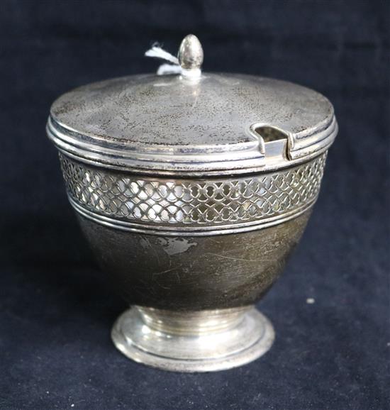 A Tiffany & Co sterling silver vase-shaped sugar bowl and cover, with ovoid finial and pierced lattice band, 8oz 8 oz.